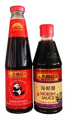 Two bottles of sauce are sitting side by side.