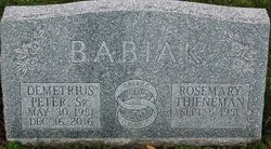 A close up of the headstone for a person