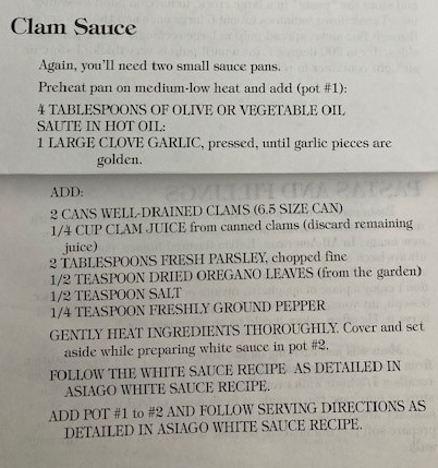 A close up of the menu for clam sauce