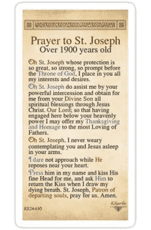 A yellow prayer card with the words " prayer to st. Joseph ".